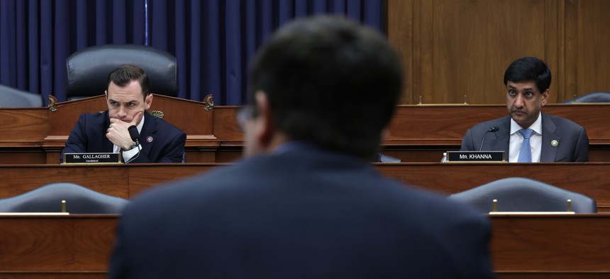 Reps. Mike Gallagher, R-Wis., and Ro Khanna, D-Calif., the chairman and ranking member of the House Armed Services Committee's cybersecurity subcommittee, listen to testimony at a March 2023 hearing.